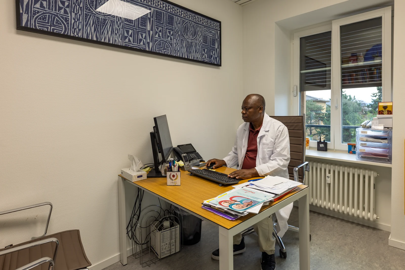 Dr Pascal Talla à son bureau de consultation